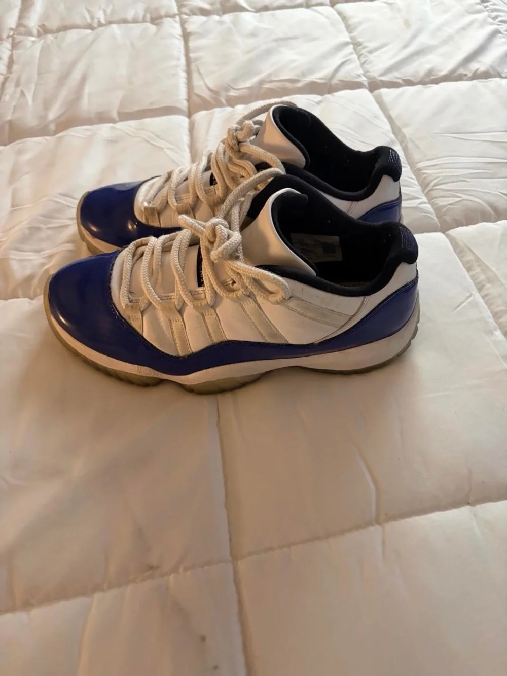 Jordan Men's Retro Low Top Sneakers in Blue, White, and Black